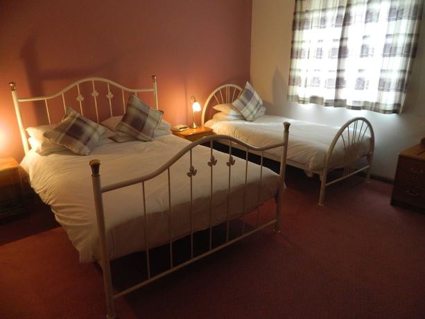 Imagen de la habitación del Hotel Red House. Foto 7