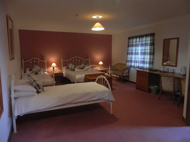 Imagen de la habitación del Hotel Red House. Foto 8