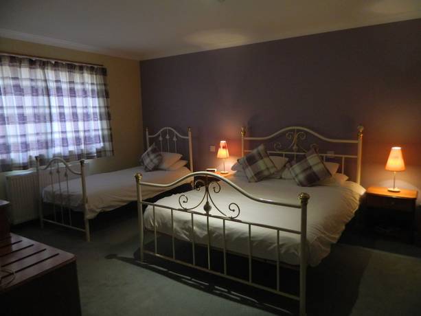 Imagen de la habitación del Hotel Red House. Foto 9