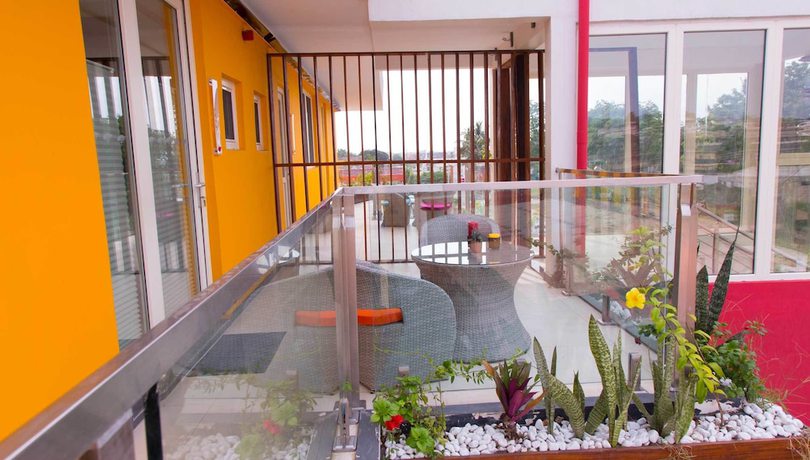 Imagen de la habitación del Hotel Red Mango Apartment. Foto 9