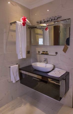 Imagen de la habitación del Hotel Red Mango Apartment. Foto 11