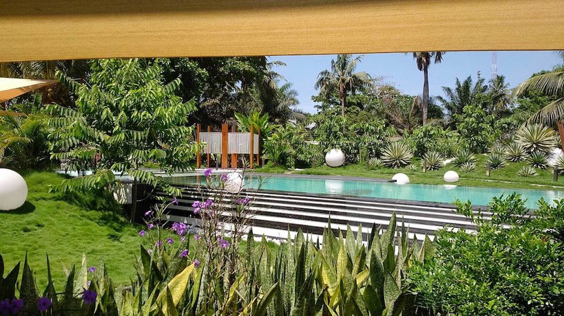 Imagen de los exteriores del Hotel Red Mango Apartment. Foto 15