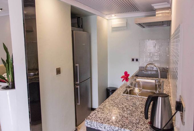 Imagen de la habitación del Hotel Red Mango Apartment. Foto 12