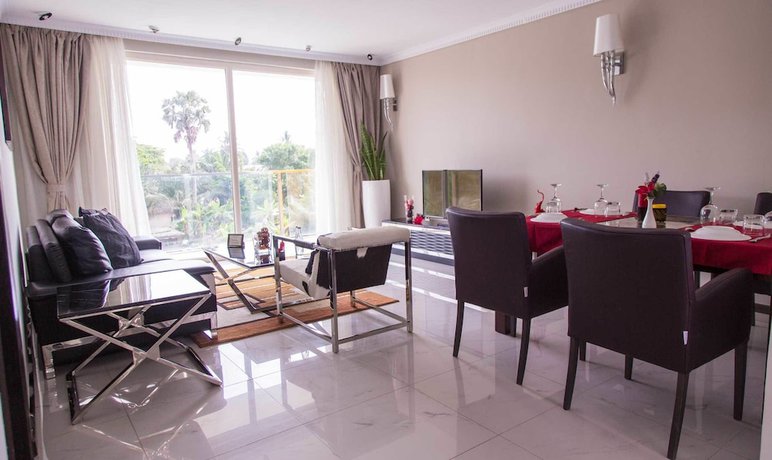 Imagen de la habitación del Hotel Red Mango Apartment. Foto 14