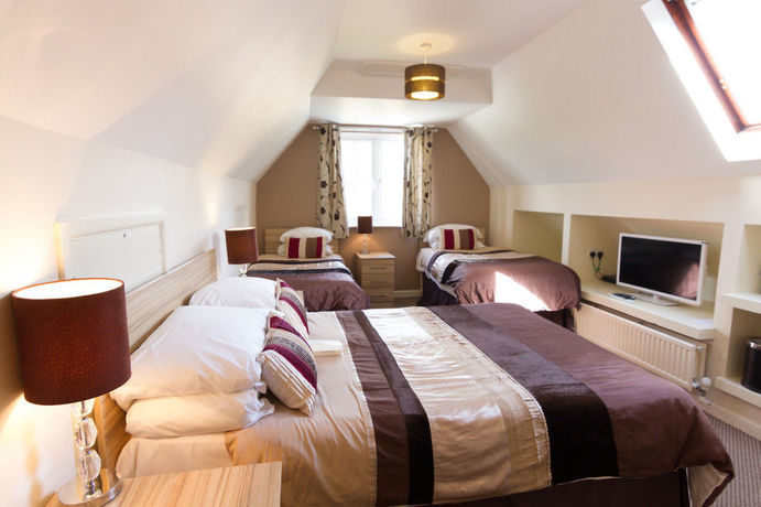 Imagen de la habitación del Hotel Red Mullions Guest House. Foto 8