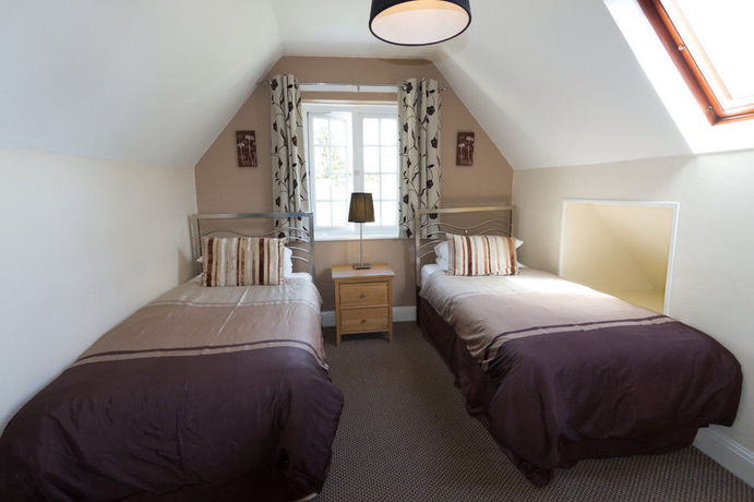 Imagen de la habitación del Hotel Red Mullions Guest House. Foto 9