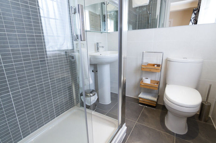 Imagen de la habitación del Hotel Red Mullions Guest House. Foto 10