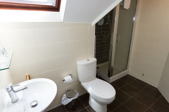 Imagen de la habitación del Hotel Red Mullions Guest House. Foto 14