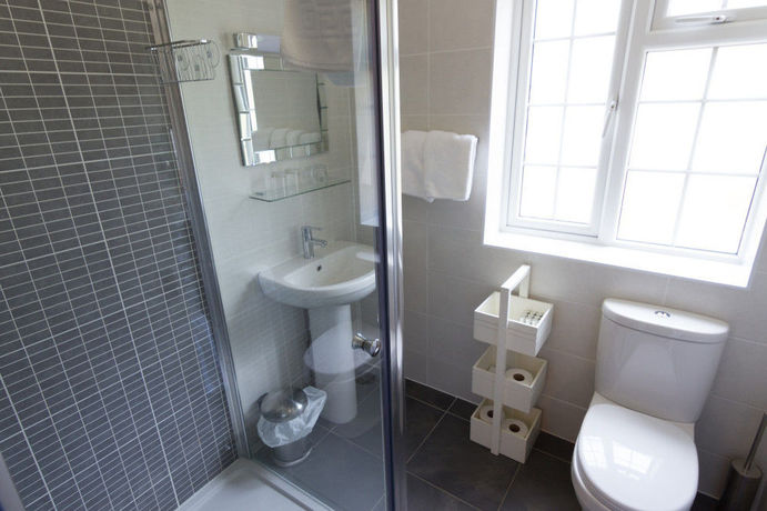 Imagen de la habitación del Hotel Red Mullions Guest House. Foto 16