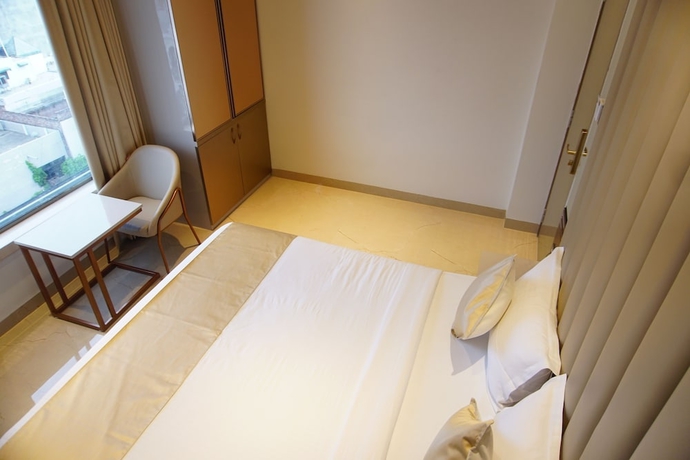 Imagen de la habitación del Hotel Red Orchid. Foto 4