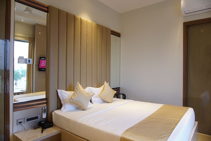 Imagen de la habitación del Hotel Red Orchid. Foto 12