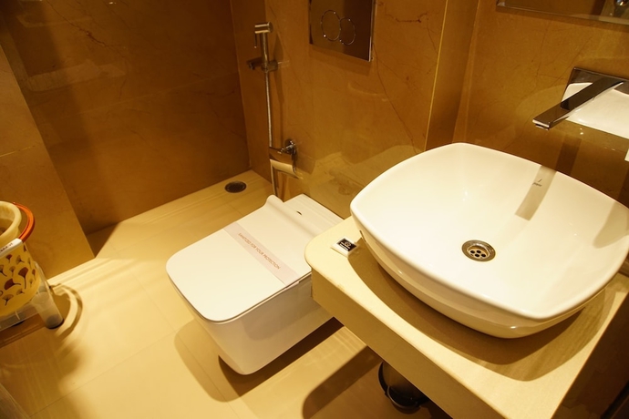 Imagen de la habitación del Hotel Red Orchid. Foto 14