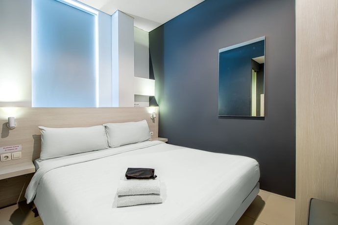 Imagen de la habitación del Hotel Red Orchid Semarang. Foto 2