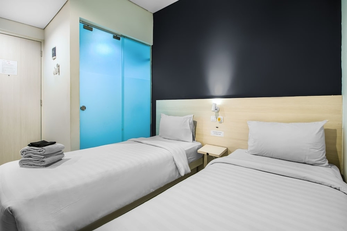 Imagen de la habitación del Hotel Red Orchid Semarang. Foto 4