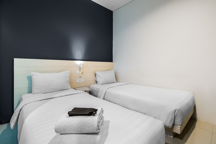Imagen de la habitación del Hotel Red Orchid Semarang. Foto 5