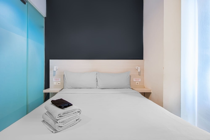 Imagen de la habitación del Hotel Red Orchid Semarang. Foto 6