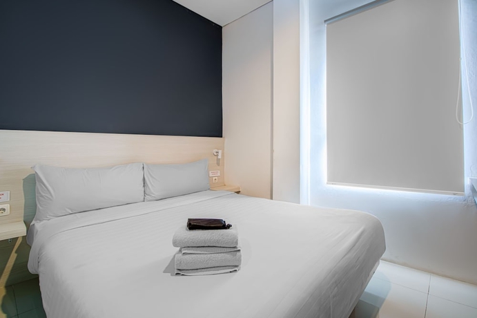 Imagen de la habitación del Hotel Red Orchid Semarang. Foto 7