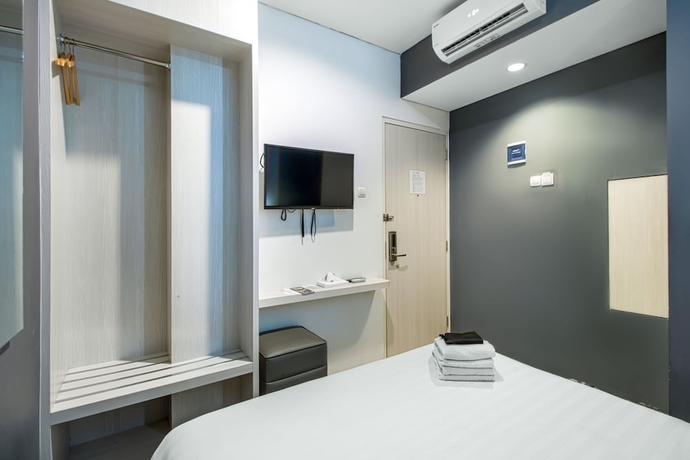 Imagen de la habitación del Hotel Red Orchid Semarang. Foto 8