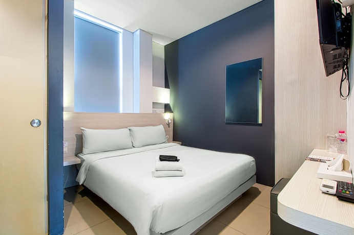 Imagen de la habitación del Hotel Red Orchid Semarang. Foto 9