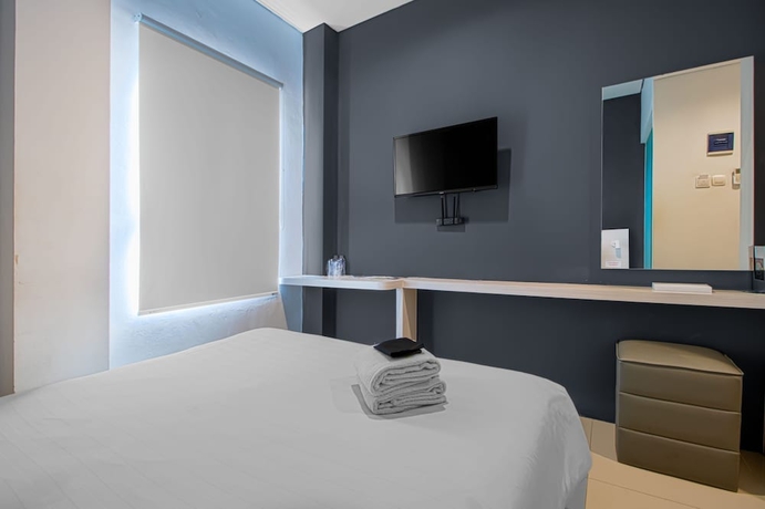 Imagen de la habitación del Hotel Red Orchid Semarang. Foto 11