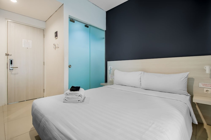 Imagen de la habitación del Hotel Red Orchid Semarang. Foto 12