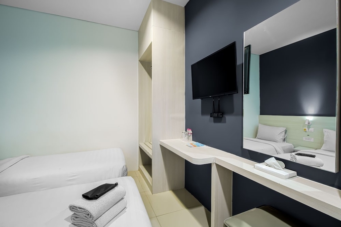 Imagen de la habitación del Hotel Red Orchid Semarang. Foto 13