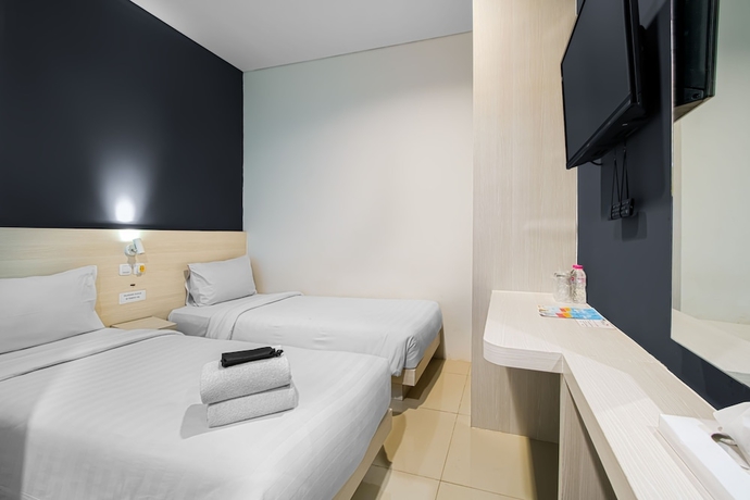 Imagen de la habitación del Hotel Red Orchid Semarang. Foto 14