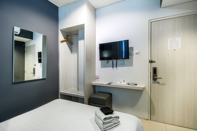 Imagen de la habitación del Hotel Red Orchid Semarang. Foto 15