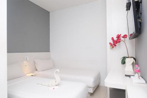 Imagen de la habitación del Hotel Red Orchid by Sajiwa. Foto 20
