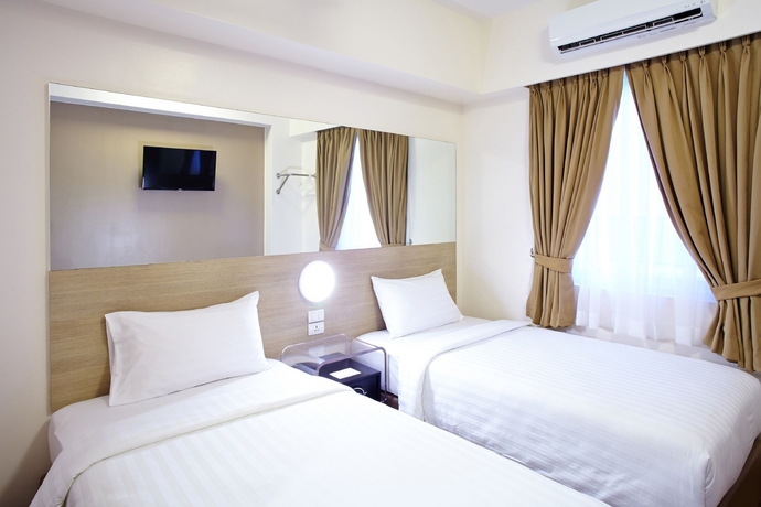 Imagen de la habitación del Hotel Red Planet Makati Avenue Manila. Foto 2