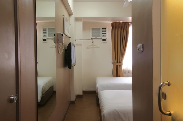 Imagen de la habitación del Hotel Red Planet Makati Avenue Manila. Foto 6
