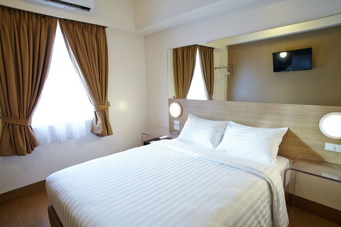 Imagen de la habitación del Hotel Red Planet Makati Avenue Manila. Foto 10