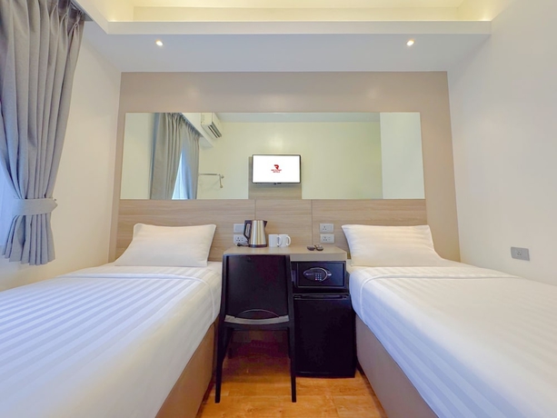 Imagen de la habitación del Hotel Red Planet Manila Aseana City. Foto 8
