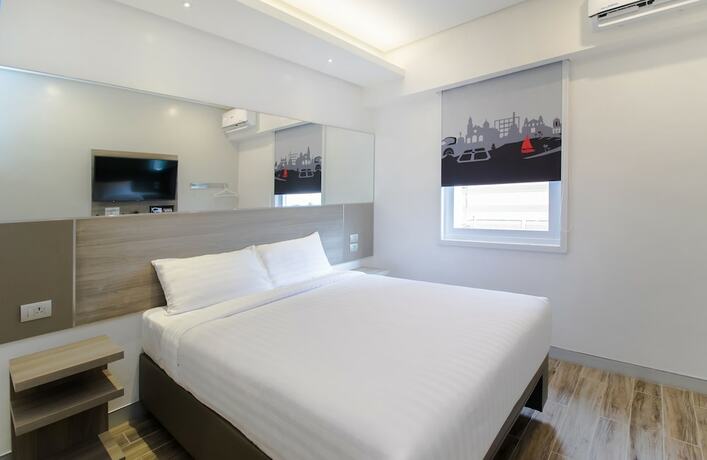 Imagen de la habitación del Hotel Red Planet Manila Bay. Foto 23