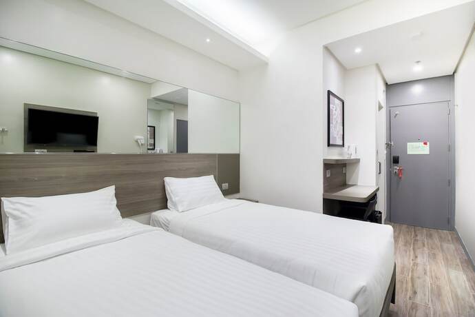 Imagen de la habitación del Hotel Red Planet Quezon Aurora Boulevard. Foto 14