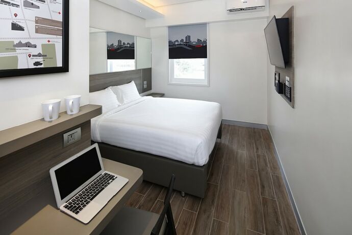 Imagen de la habitación del Hotel Red Planet Quezon Aurora Boulevard. Foto 17