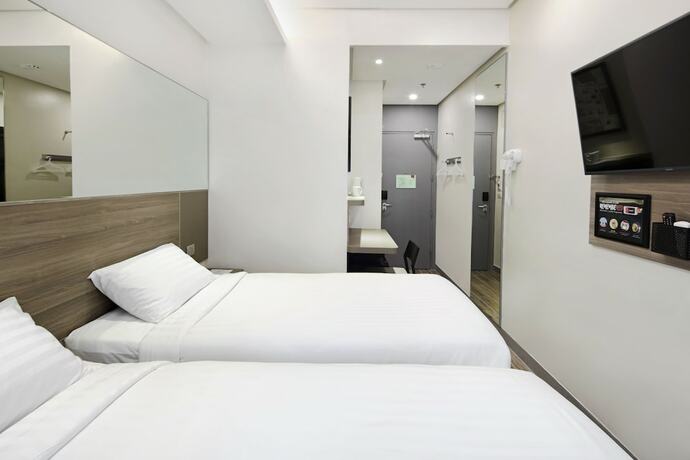Imagen de la habitación del Hotel Red Planet Quezon Aurora Boulevard. Foto 21