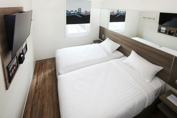 Imagen de la habitación del Hotel Red Planet Quezon Aurora Boulevard. Foto 23