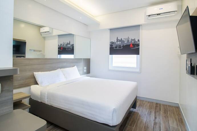Imagen de la habitación del Hotel Red Planet Quezon Aurora Boulevard. Foto 26