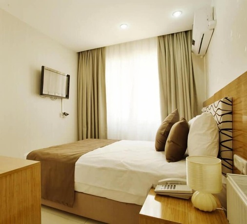 Imagen de la habitación del Hotel Red Point Holiday Village. Foto 7