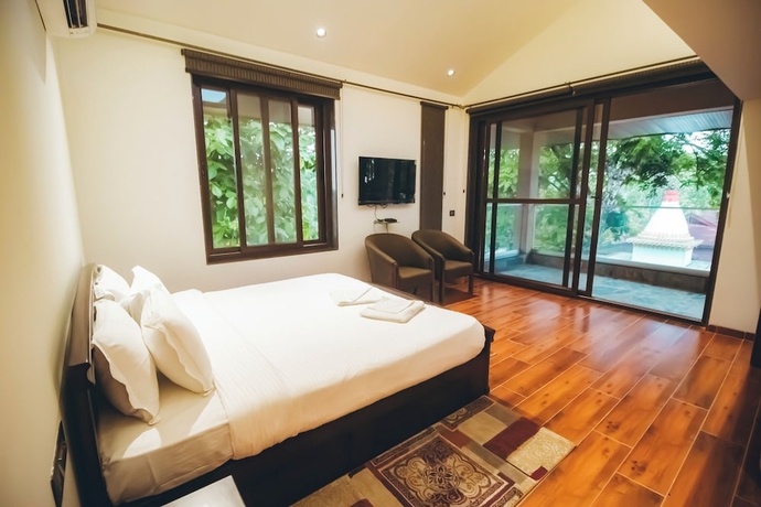 Imagen de la habitación del Hotel Red River Bungalow. Foto 1