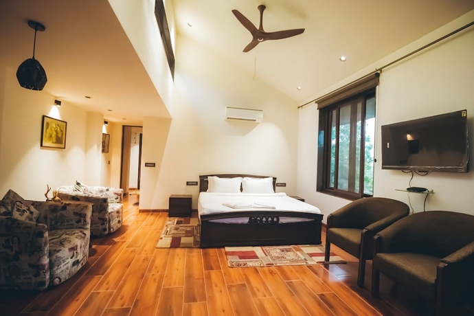 Imagen de la habitación del Hotel Red River Bungalow. Foto 2