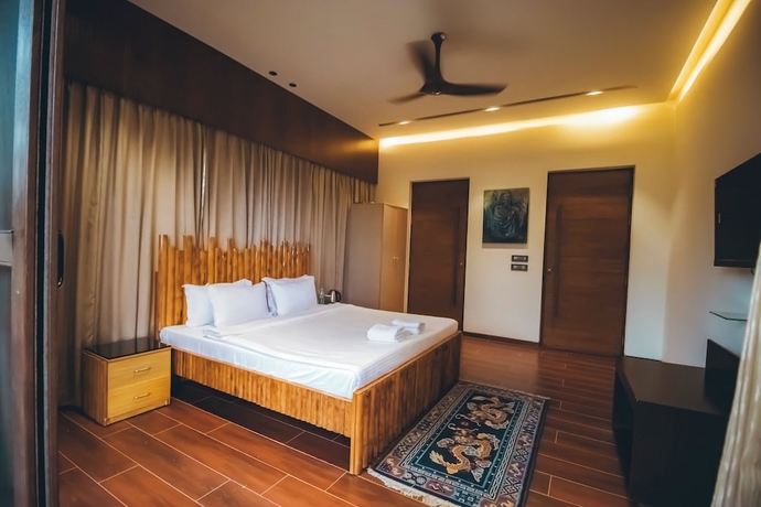 Imagen de la habitación del Hotel Red River Bungalow. Foto 4