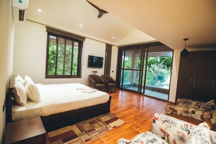 Imagen de la habitación del Hotel Red River Bungalow. Foto 5