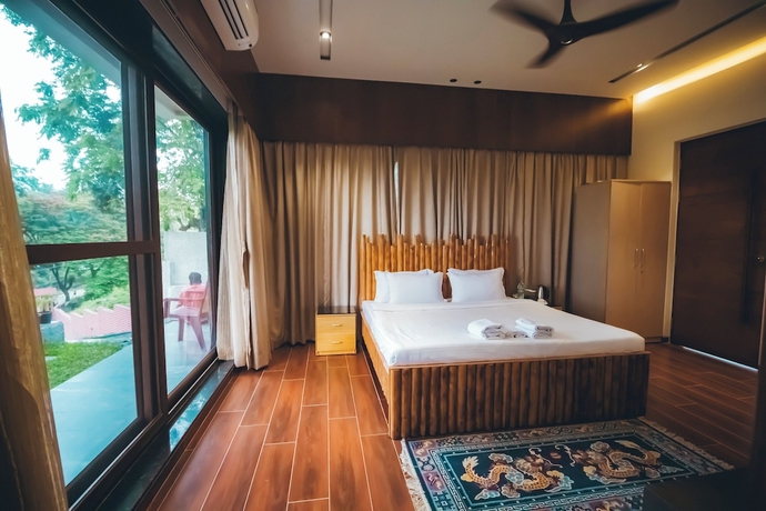 Imagen de la habitación del Hotel Red River Bungalow. Foto 6