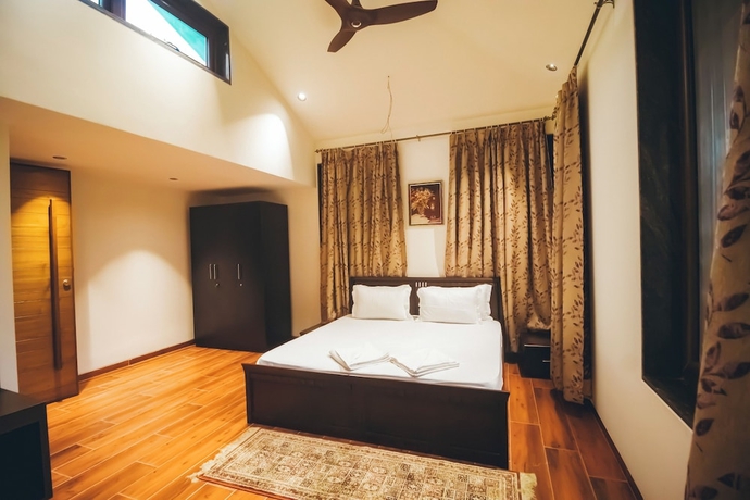 Imagen de la habitación del Hotel Red River Bungalow. Foto 8