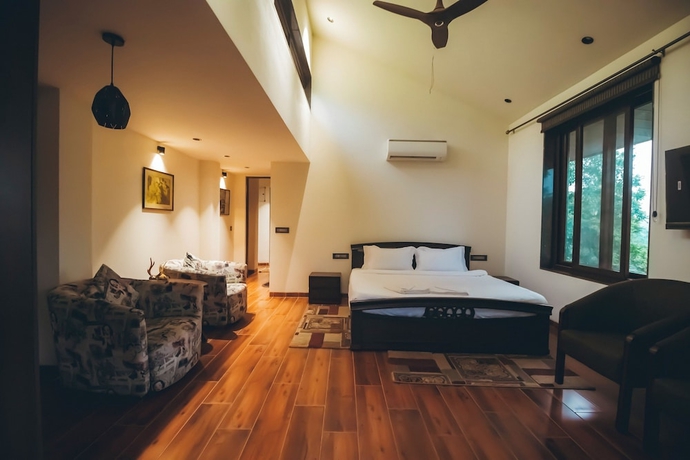 Imagen de la habitación del Hotel Red River Bungalow. Foto 9