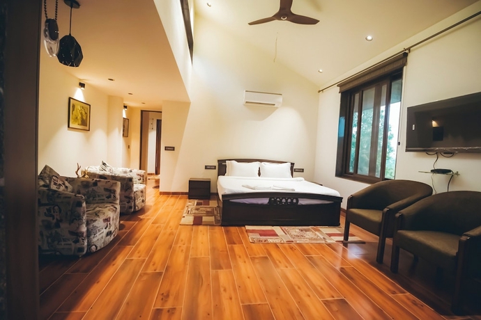 Imagen de la habitación del Hotel Red River Bungalow. Foto 10