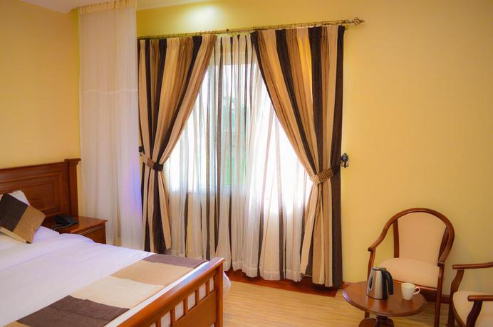 Imagen de la habitación del Hotel Red Ruby. Foto 11