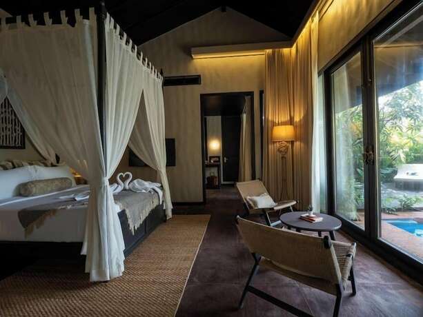 Imagen de la habitación del Hotel Red Thread Morjim. Foto 13